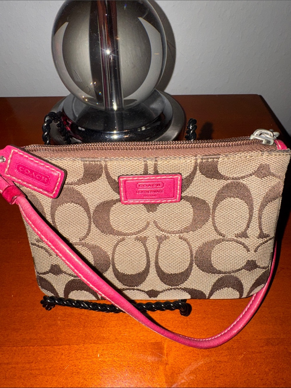 Coach Brown Signature Canvas Wristlet with Pink Logo Patch